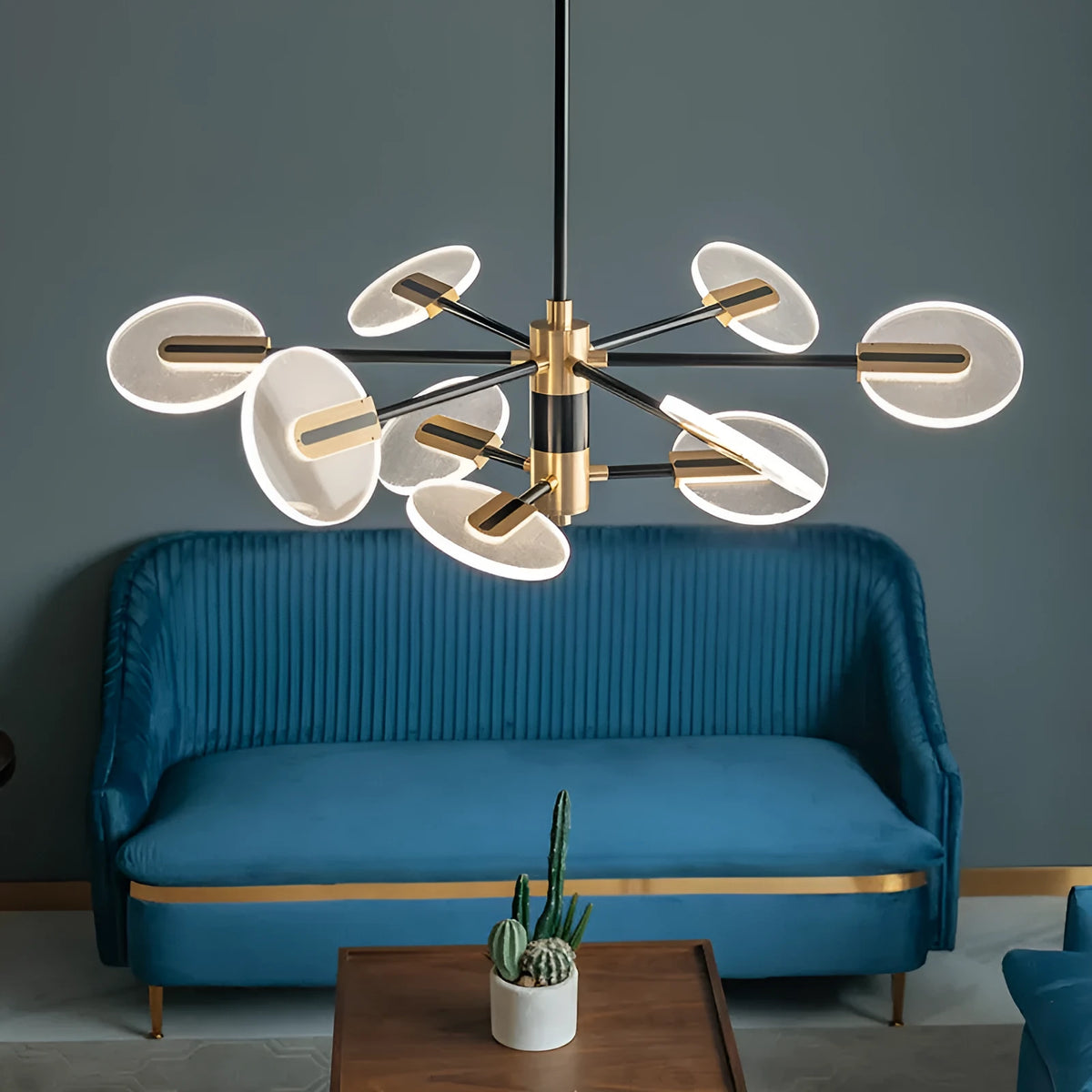 Nordic iron LED chandelier with multiple heads in acrylic detailing hanging from ceiling