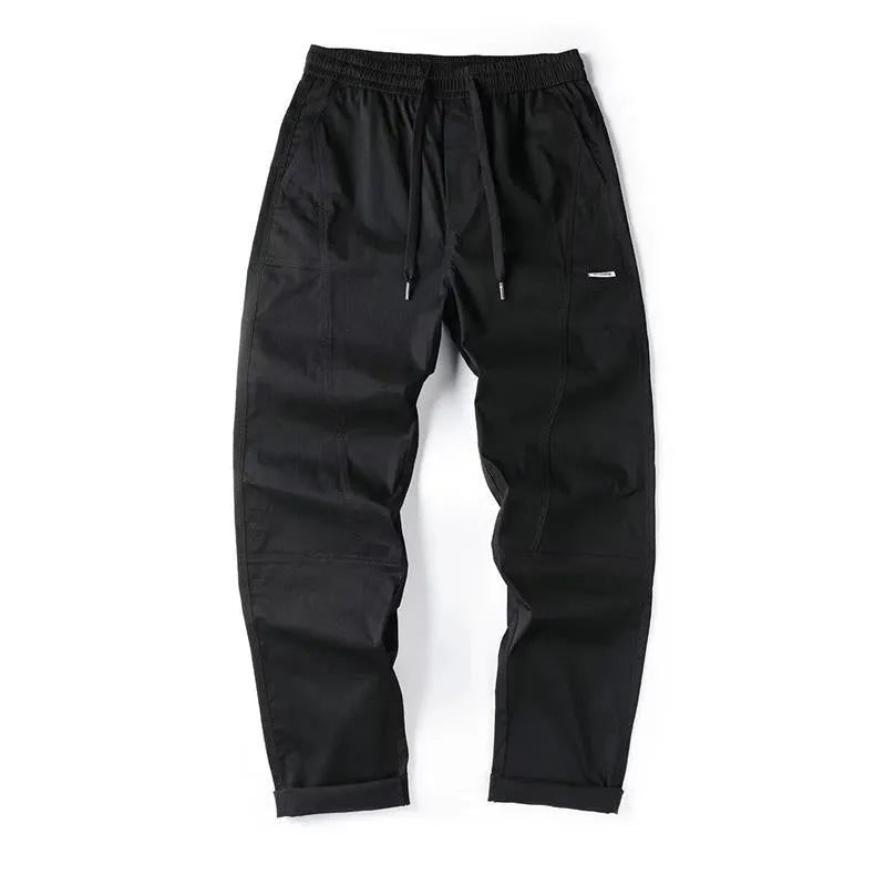 Cotton wide-leg trousers with antibacterial function in milky white and black colours showing pants-mouth design