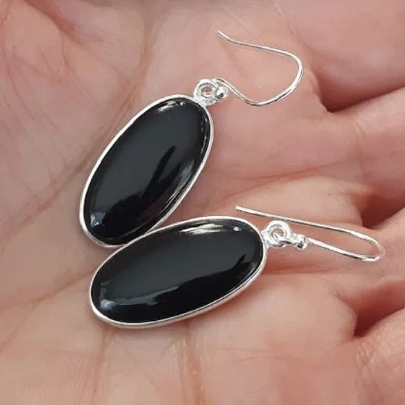 Women's black agate oval pendant earrings with geometric Chinese style framework and 925 silver electroplated finish