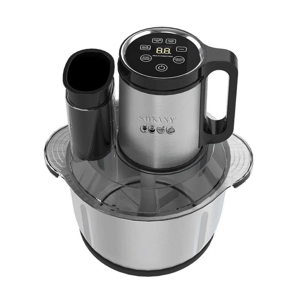 Stainless steel meat grinder and vegetable cutting machine on a kitchen counter