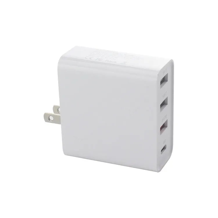 Four-port USB-C wall charger with LED light in black or white colours showing UK, EU, US and AU plug variants