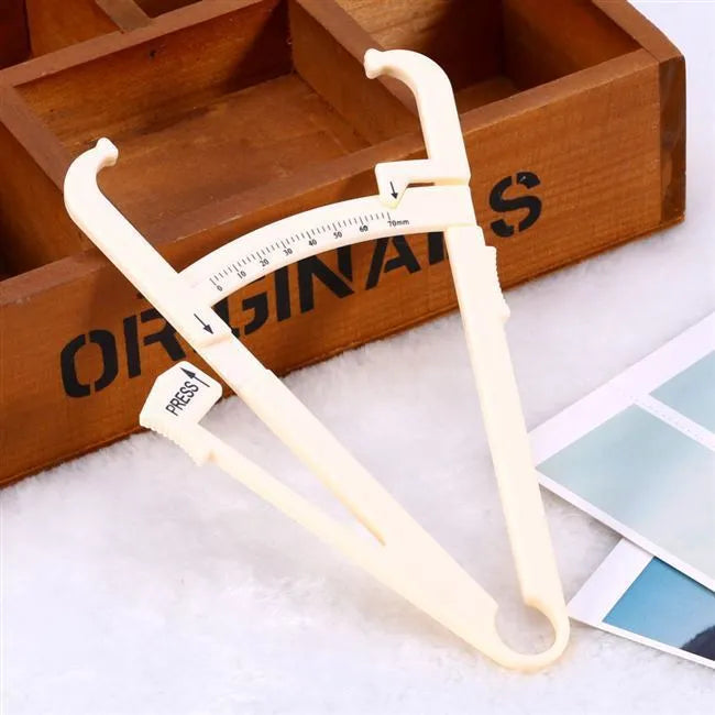 Acrylic fat caliper body fat measuring instrument showing measurement scales and 200mm range