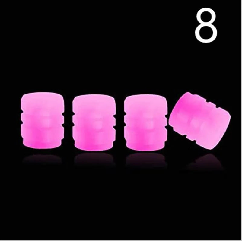 Pack of luminous LED tyre valve caps in blue light colour on a rubber stem.