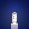 Small white USB LED night light with warm and white light settings.