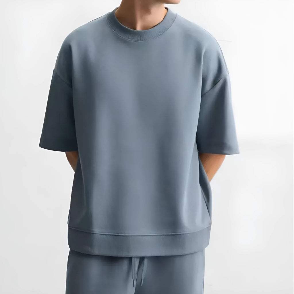 Loose fit double-sided texture polyester short sleeve top and matching shorts set in blue colour