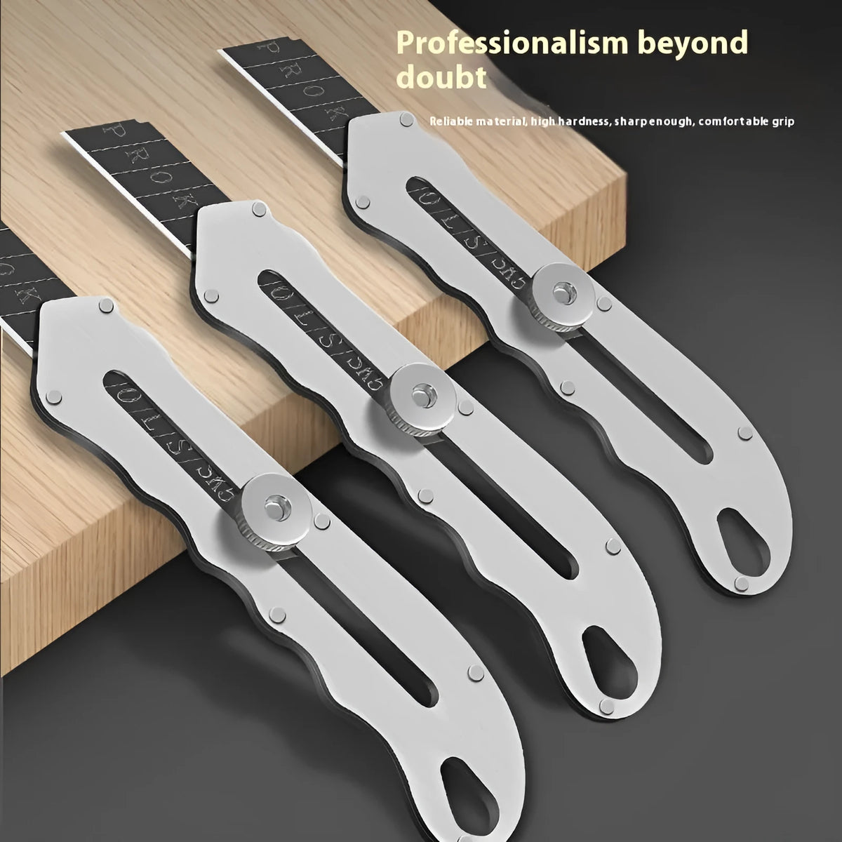 Stainless steel folding art knife with black blade and packs of long and trapezoidal blades