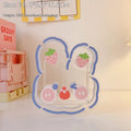 Square acrylic storage box with colourful character pattern measuring 18cm for desk organisation