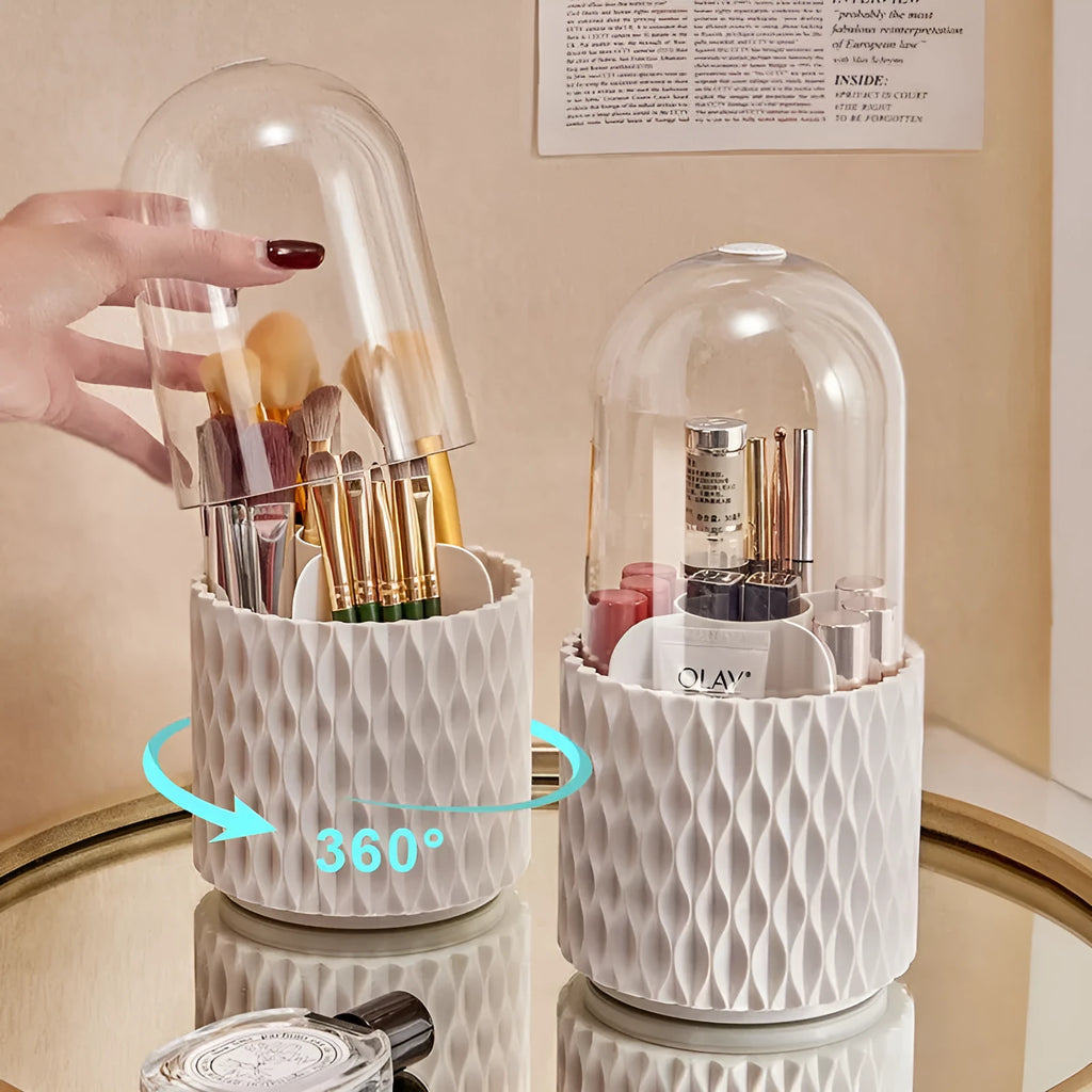 White rotating acrylic makeup brush holder with transparent lid on a desktop