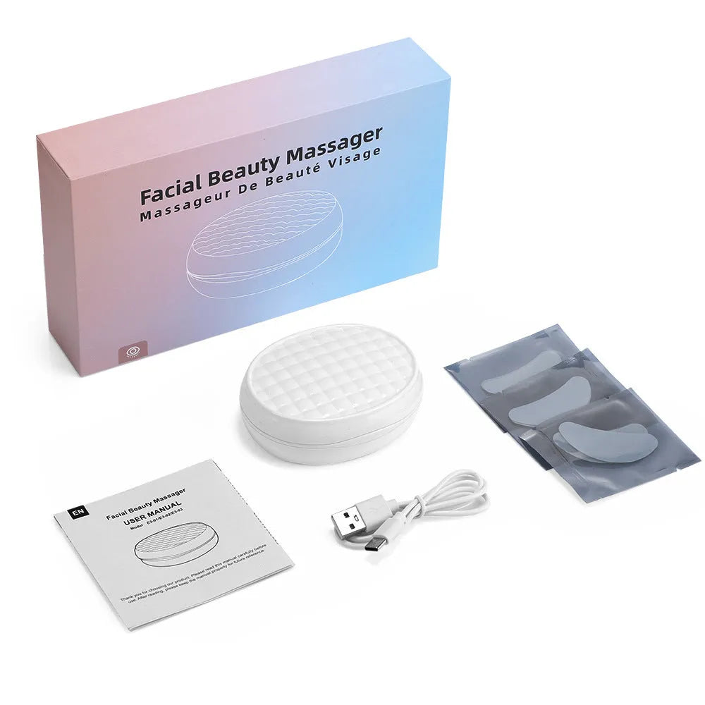 White wireless red light eye and facial massager with EMS technology for dark circles reduction