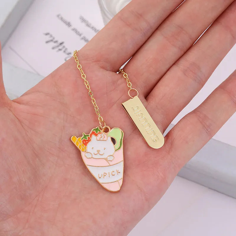 Jane Lime cat metal bookmark with cartoon pendant in four colour designs measuring 3.8cm by 18.3cm