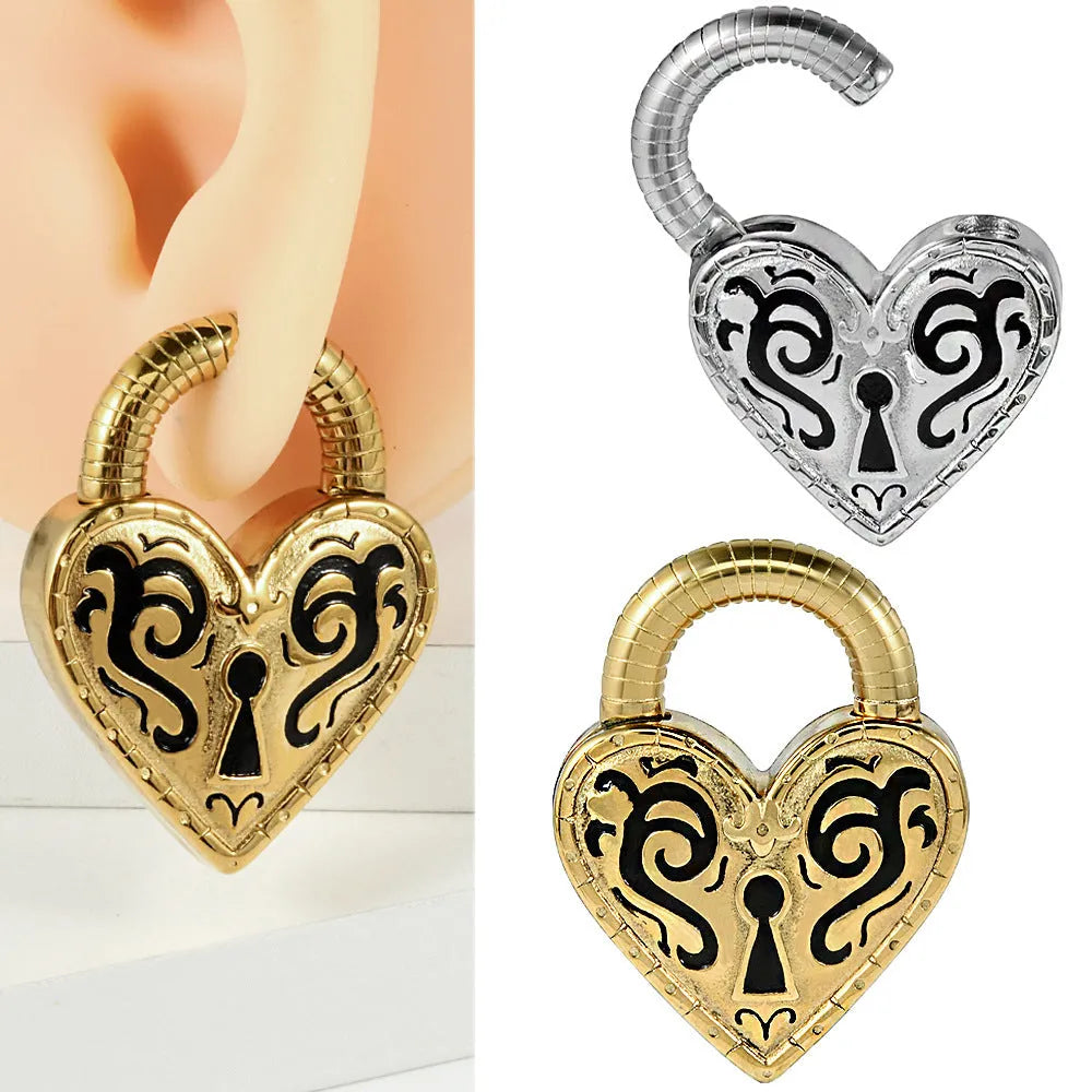 Women's heart-shaped stainless steel earrings in gold and steel colour options.