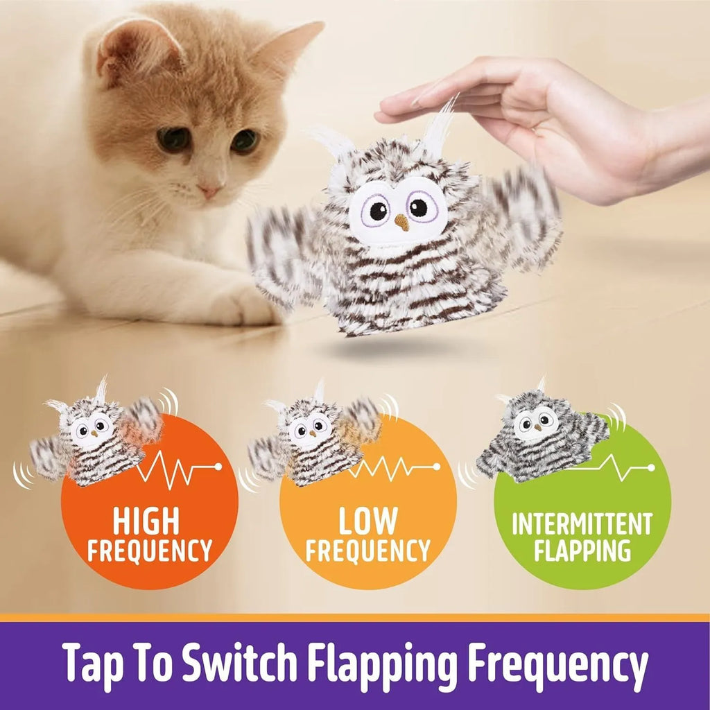 Grey interactive owl cat toy with flapping wings on flat surface