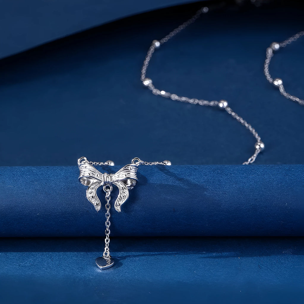 S925 sterling silver necklace with heart-shaped butterfly pendant on an adjustable O-ring chain.