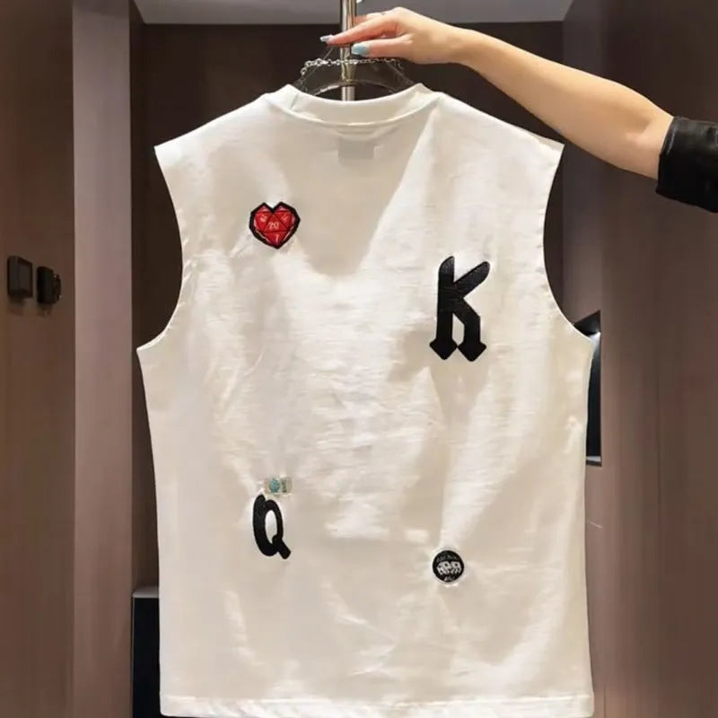 Men's black cotton sleeveless vest T-shirt with a cartoon print graphic, showing loose fit.