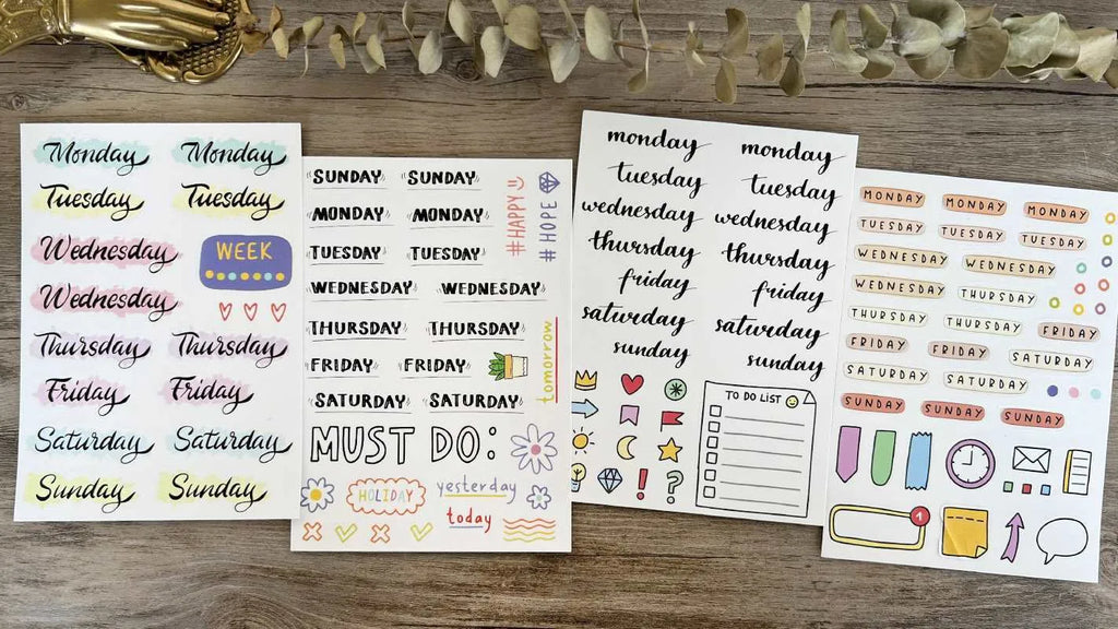 Set of printed cute-style stickers showing English letters, numbers, and weekday words on a sheet.