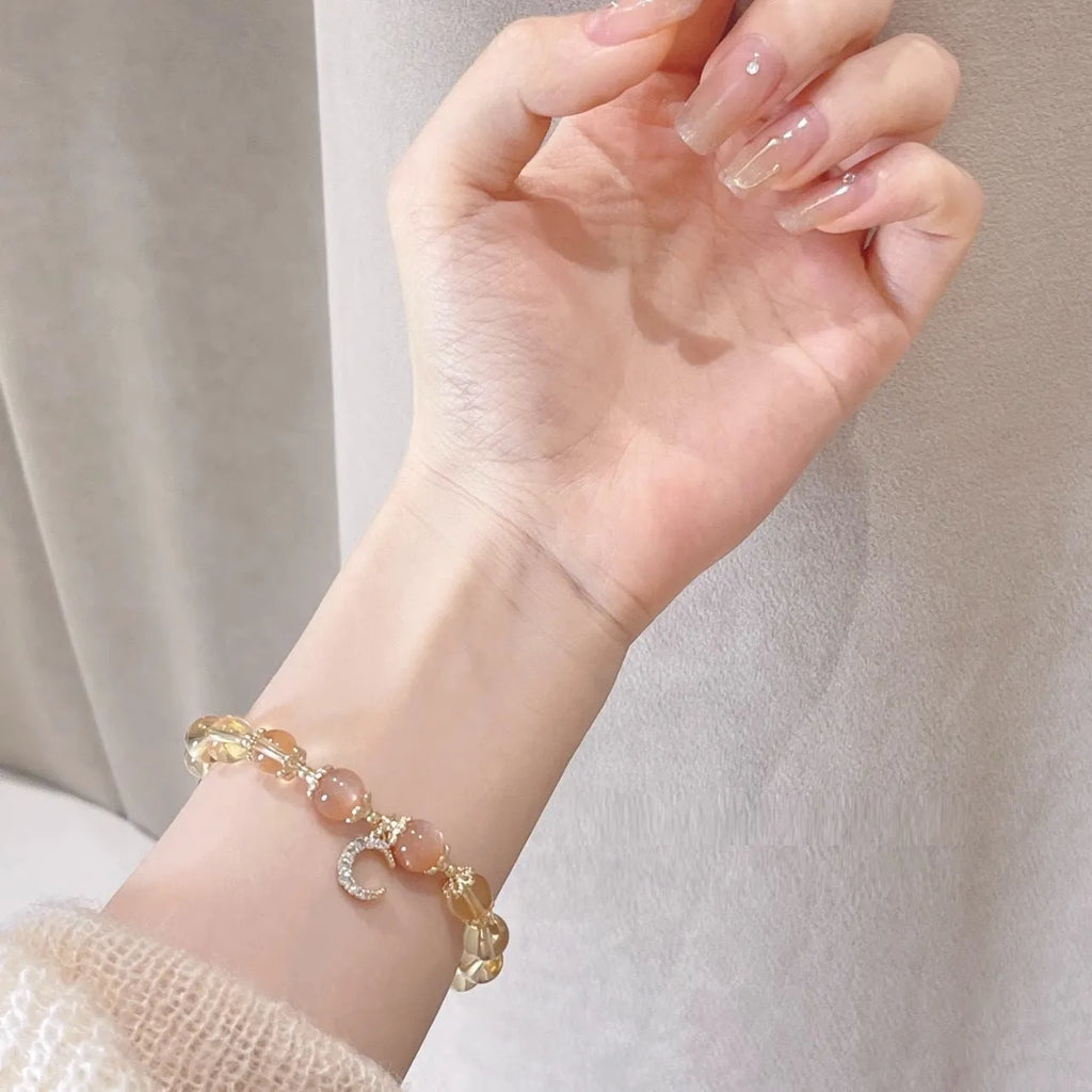 Women's Chinese style crystal bracelet with citrine moonstone and 14K gilded finish