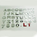 Metal zinc alloy 3D car bumper sticker showing raised English letter, approximately 2.5cm in size