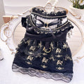 Golden gothic princess-style tiered skirt dress for a small dog or cat on a mannequin.