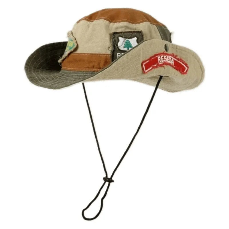 Army green women's fisherman hat with patchwork design and hand-painted details