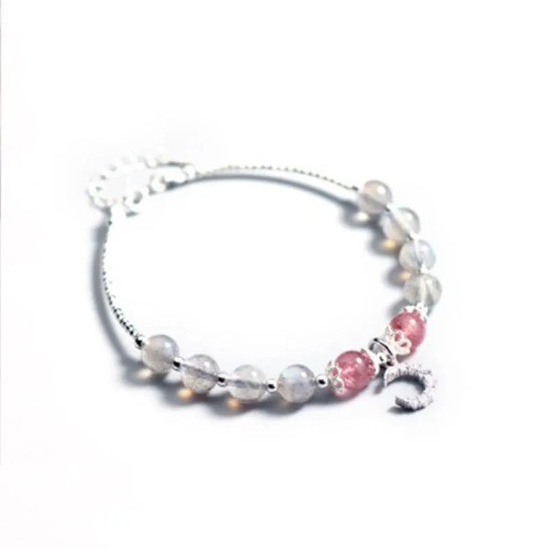 Handmade adjustable silver tone bracelet with natural moonstone crystal and small crescent moon charm
