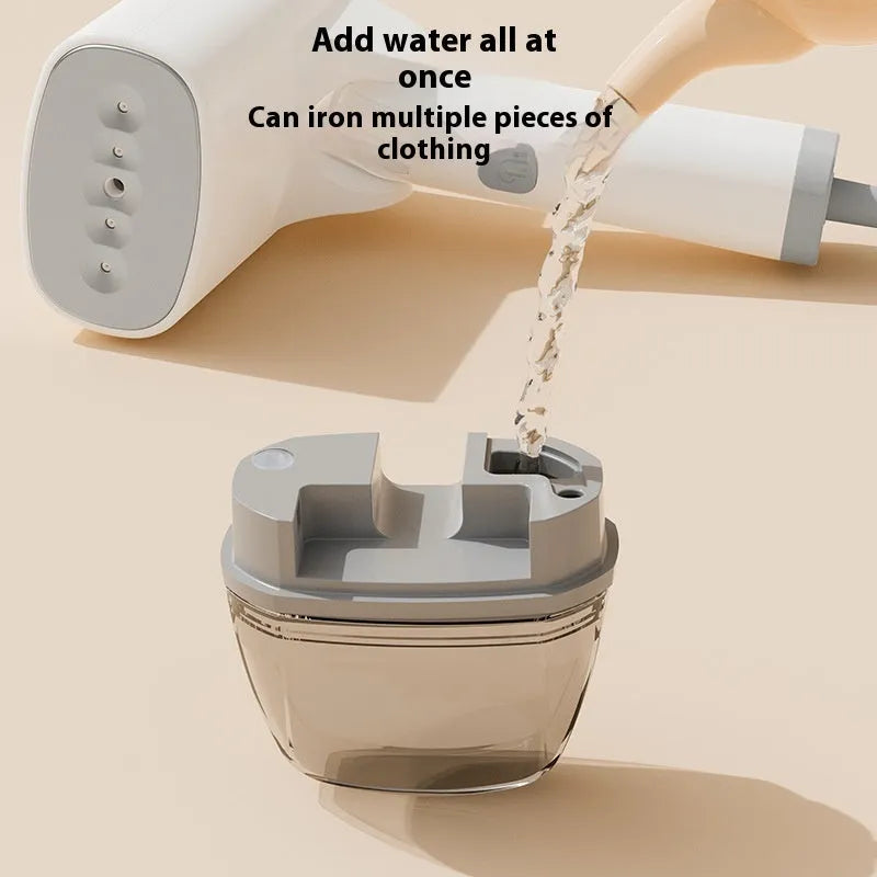 Blue and white handheld garment steamer with water tank and nozzle.