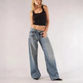 Blue loose fit women's cotton wide leg trousers with low waist and straight leg