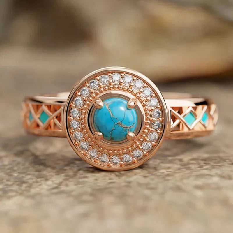 Women's turquoise ethnic style ring with zircon inlay and rose gold finish on copper, geometric shape.