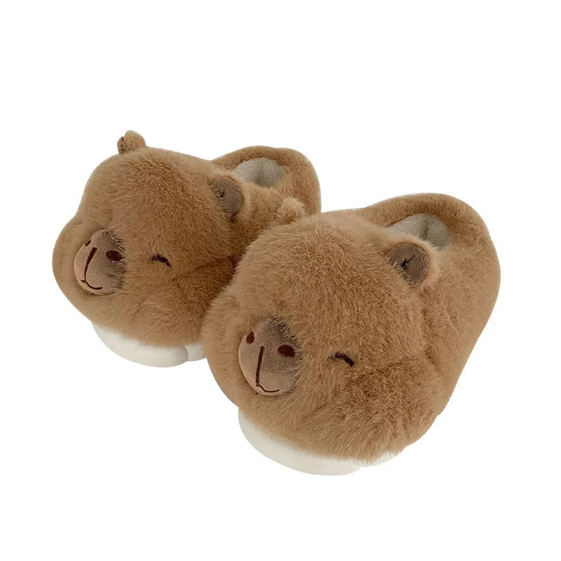 Light brown women's winter slippers with plush upper, artificial wool lining, and slip-on design