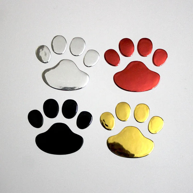 PVC car sticker with 3D hand-shaped brush texture forming dog footprints, in black, gold, red, or silver.