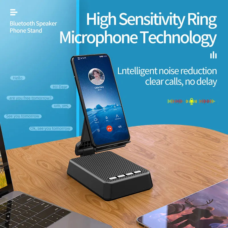 Black mobile phone broadcast stand with integrated Bluetooth speaker and microphone on a desk.