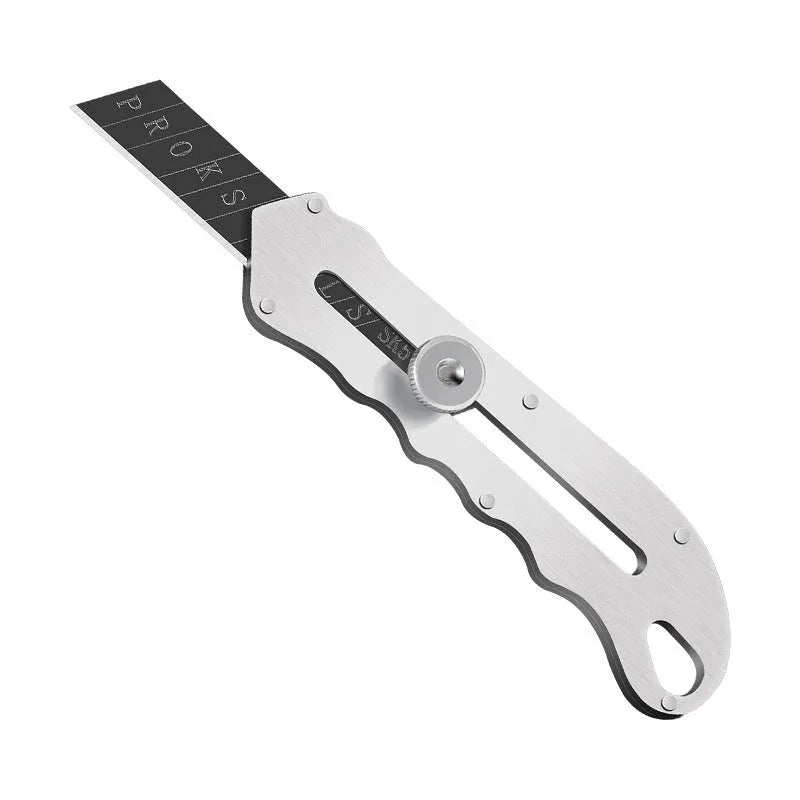Stainless steel folding art knife with black blade and packs of long and trapezoidal blades