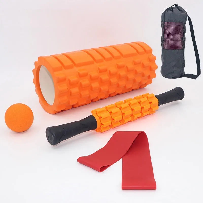 Black foam massage roller stick with six gear segments, 33cm long.