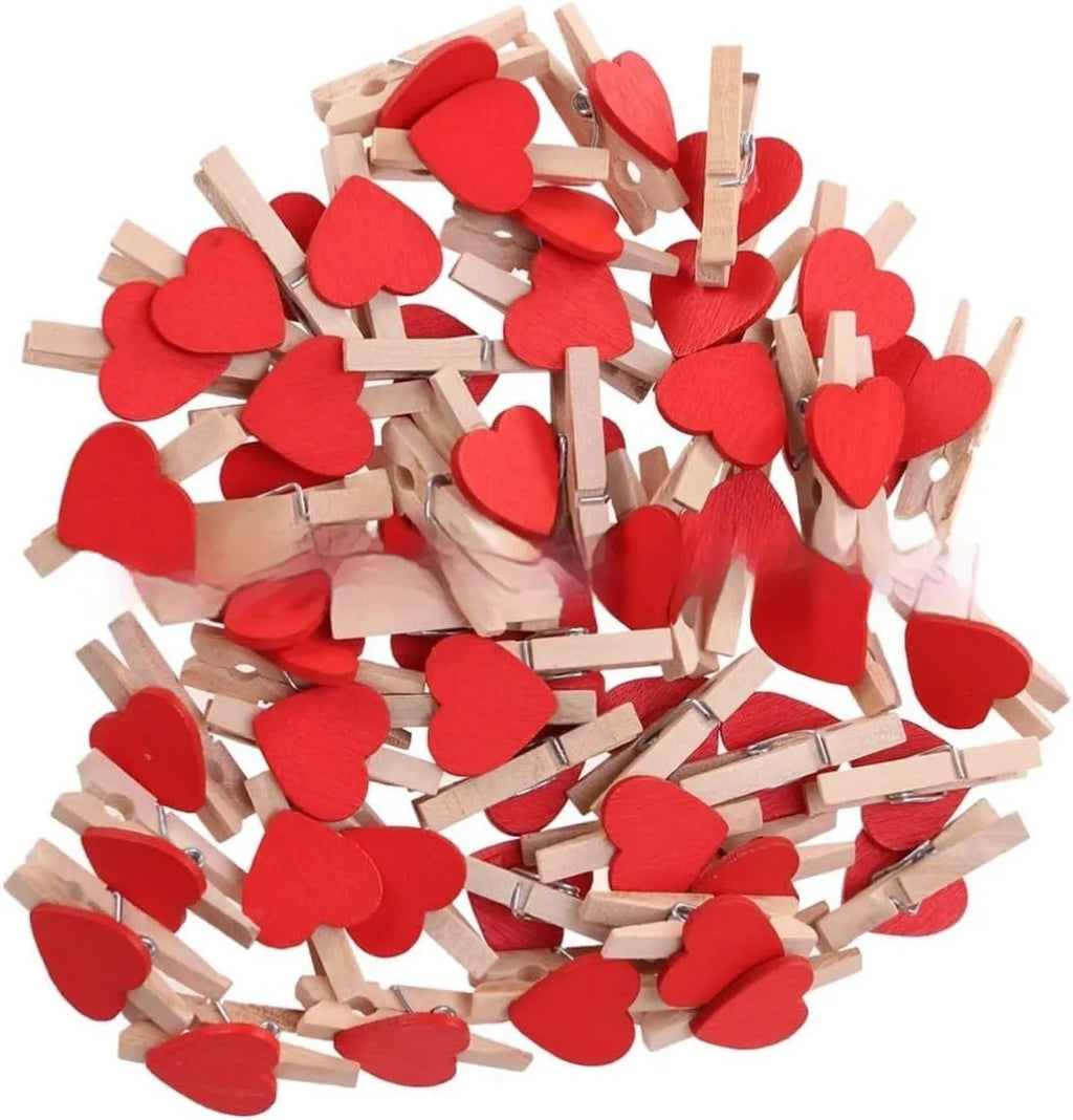 Set of five solid wood heart-shaped clips in red, pink, white, yellow, and rose colours.