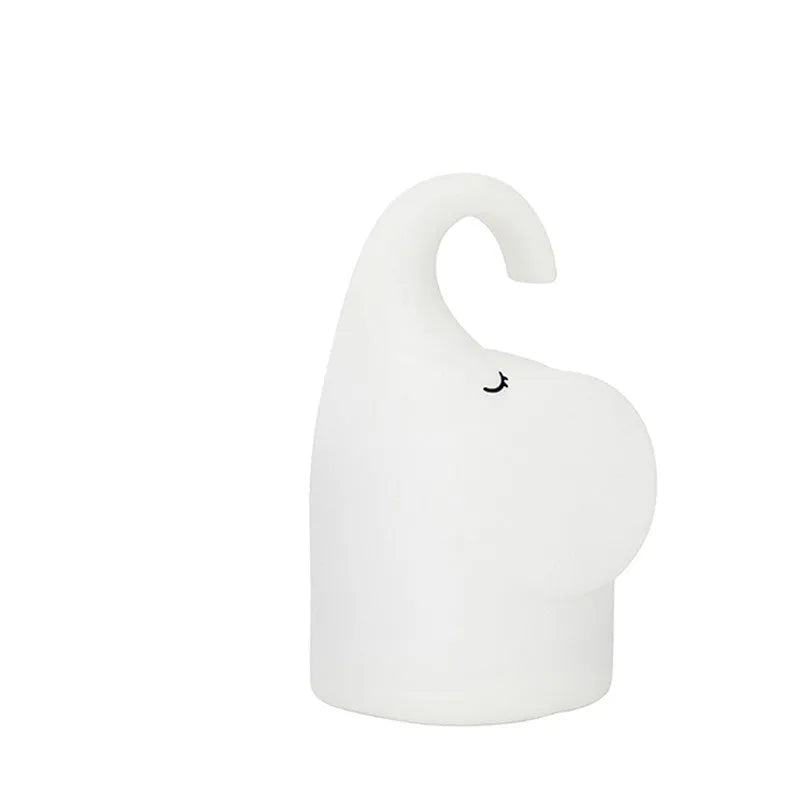 Elephant-shaped silicone night light with warm white LED glow for bedroom bedside use