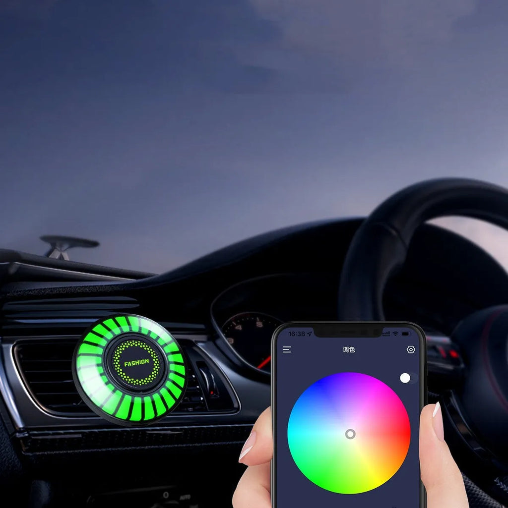 Car air outlet aromatherapy diffuser with RGB rhythm lighting mounted on car vent