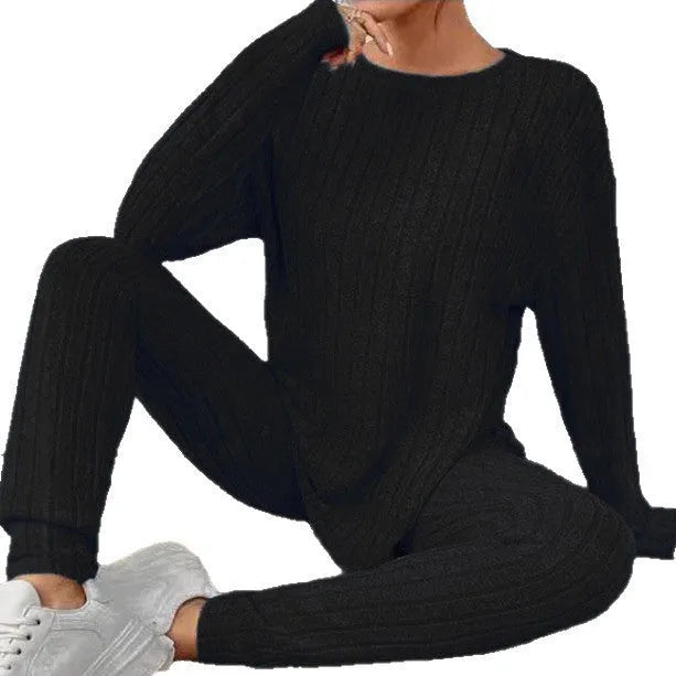 Women's black and blue polyester two-piece lounge set with sunken stripe pattern in extended sizes