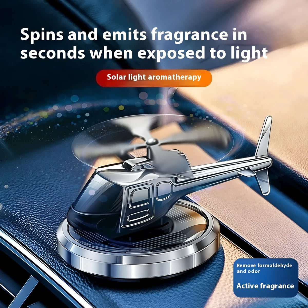 Silver solar powered rotating helicopter car perfume ornament on vehicle dashboard