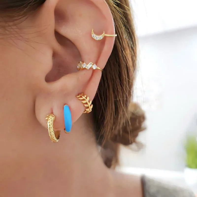 Geometric U-shaped epoxy oval earrings in multiple colours with silver needle copper construction