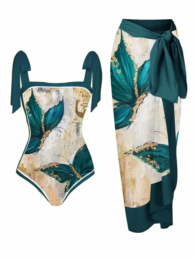Women's printed floral chiffon two-piece swimsuit with a matching hip skirt.