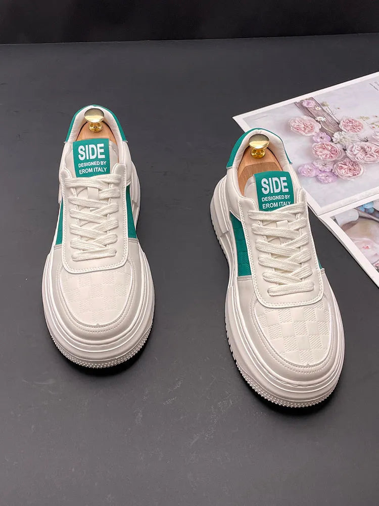 White cloth sports casual shoes with green or black accents and rubber foam soles