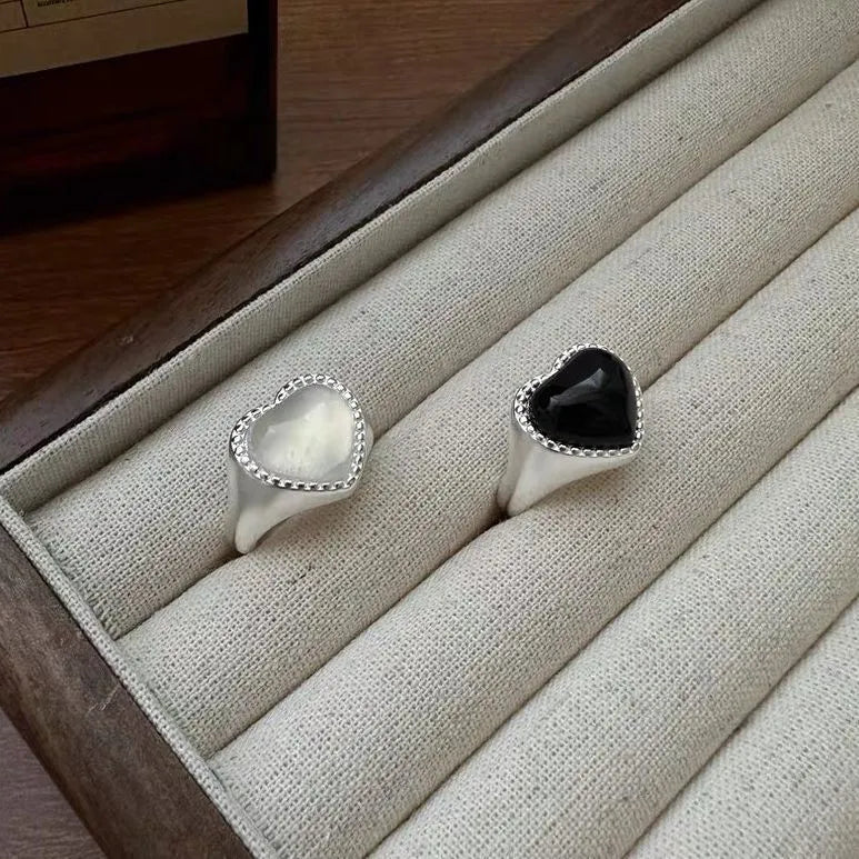 S925 sterling silver adjustable ring with black agate heart in open mouth design.