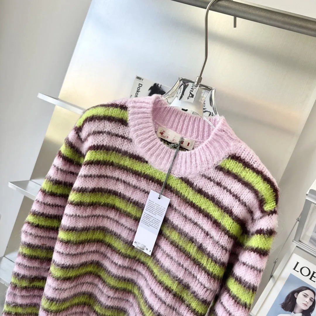 Pink Haima wool knitted cardigan sweater on a hanger, showing round-neck and open cardigan styles.