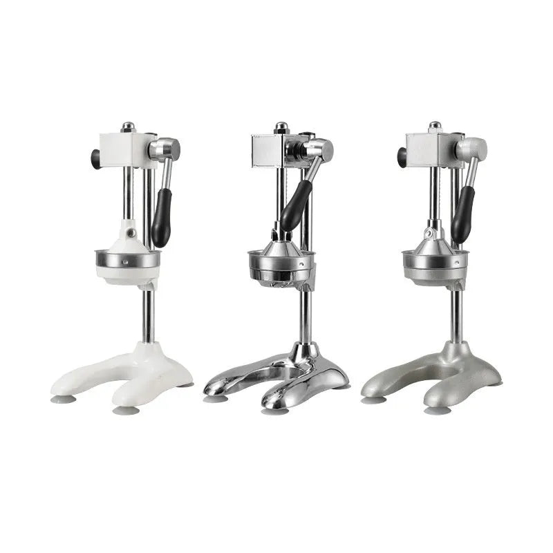 Vertical stainless steel manual citrus juicer in chosen colour with selected head style on kitchen worktop.