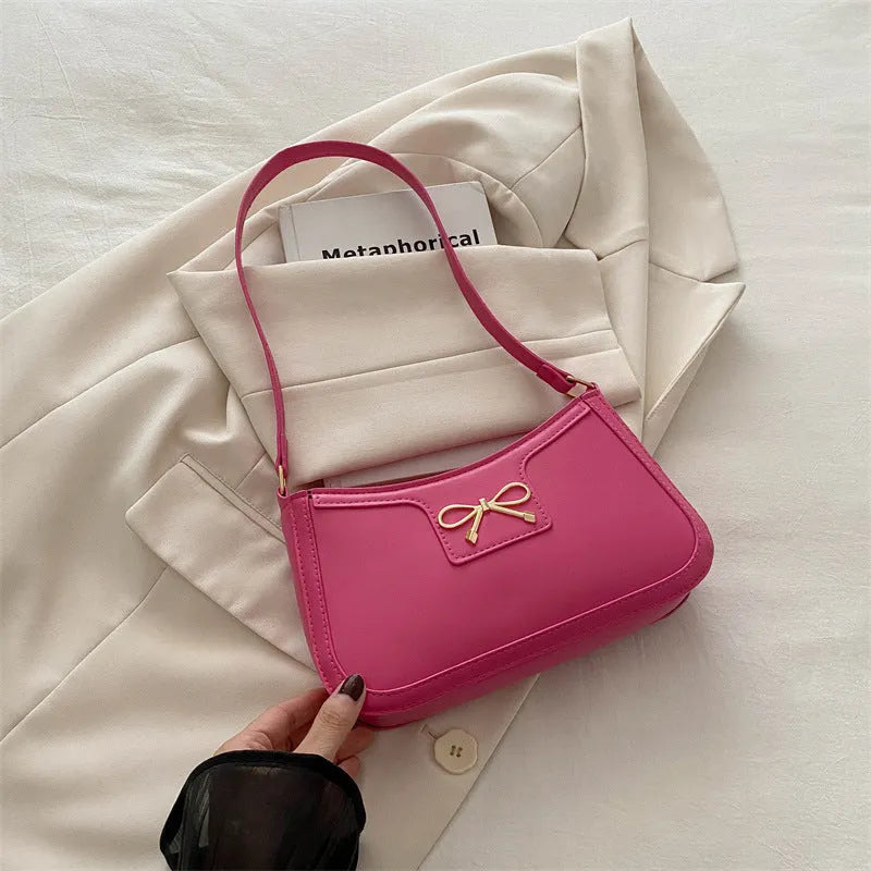 Square PU leather shoulder bag with a single strap and bow decoration in a choice of six colours