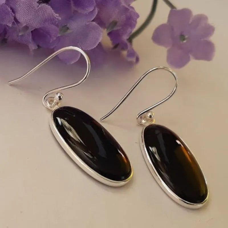 Women's black agate oval pendant earrings with geometric Chinese style framework and 925 silver electroplated finish