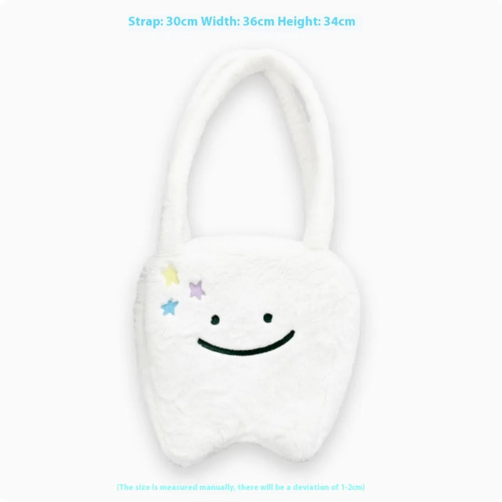 White plush shoulder tote bag with large tooth design and cute teeth pattern, showing zipper closure