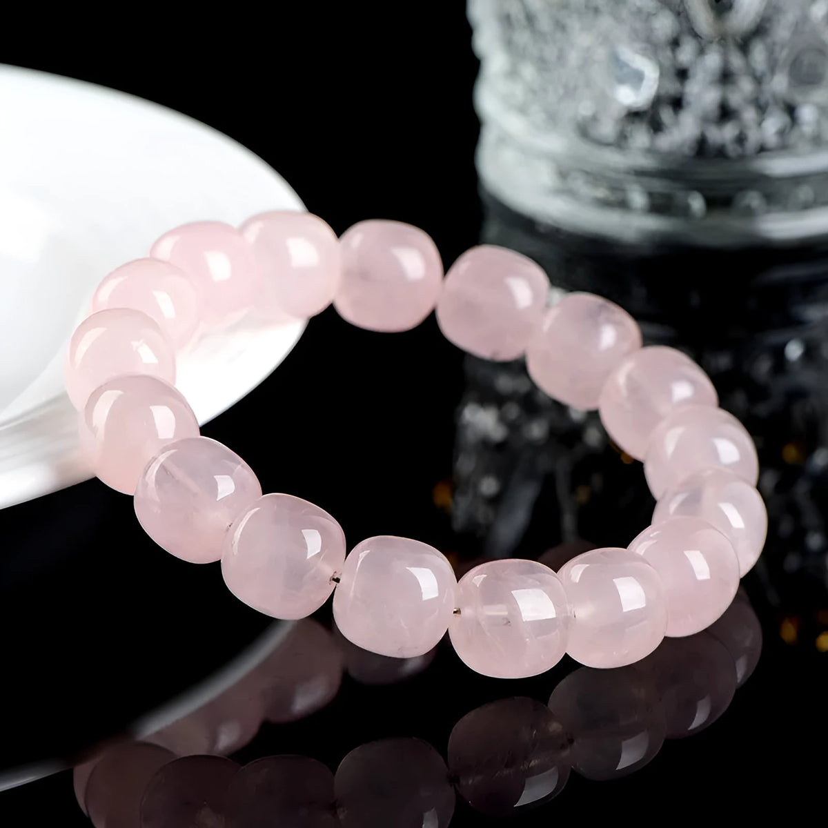 Pink natural crystal bamboo barrel bead bracelet with geometric 11-12mm beads.