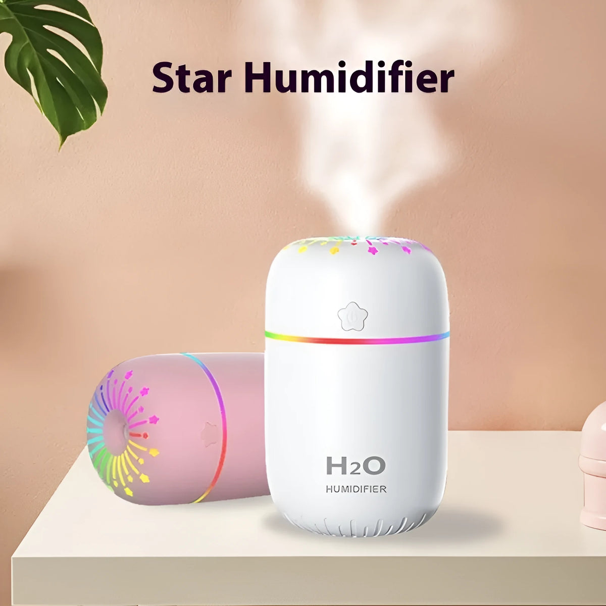 Small white USB humidifier with 300ml tank on desk next to laptop