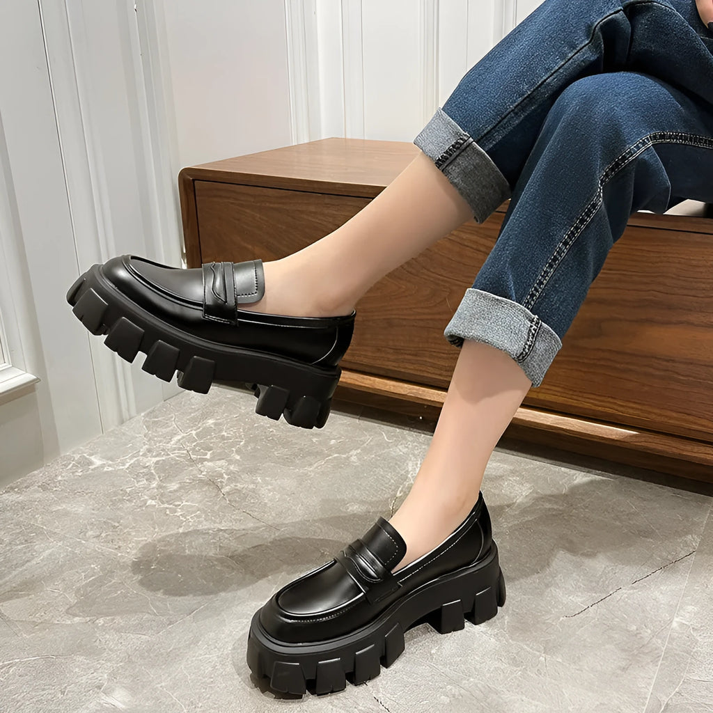 British style wide fit loafers for men and women in patent leather or matte finish with rubber sole.