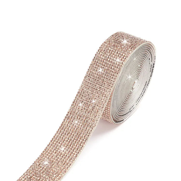 A long strip of self-adhesive glass rhinestones for hot-fix application on clothing and shoes.